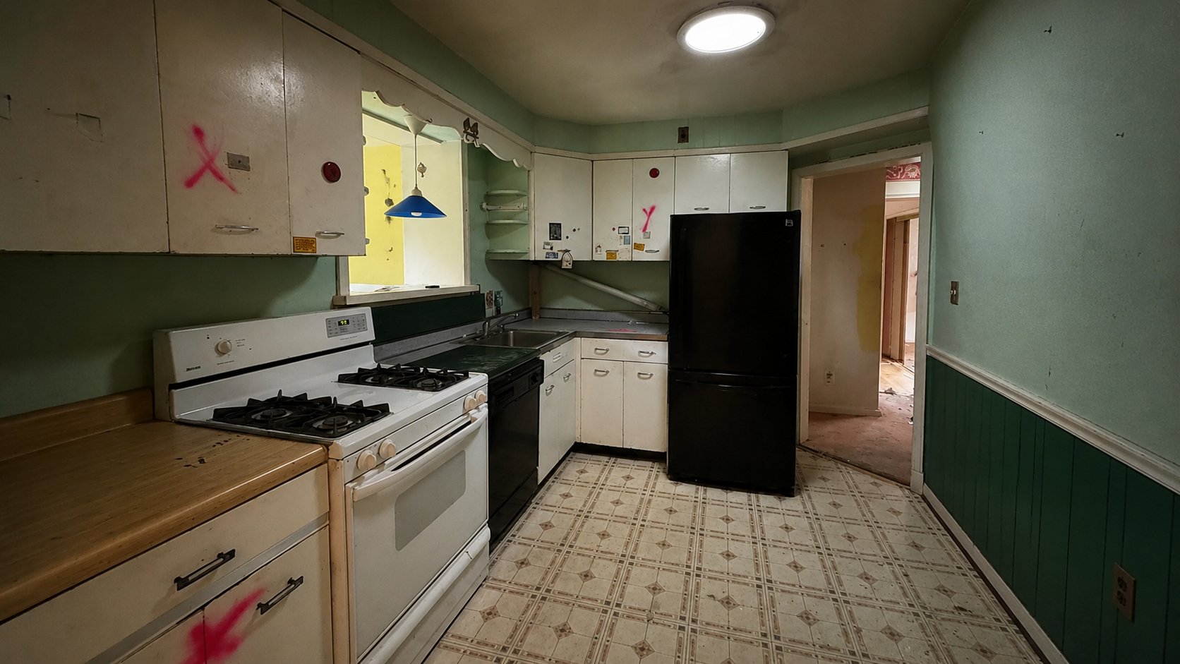 Before renovation — dated kitchen
